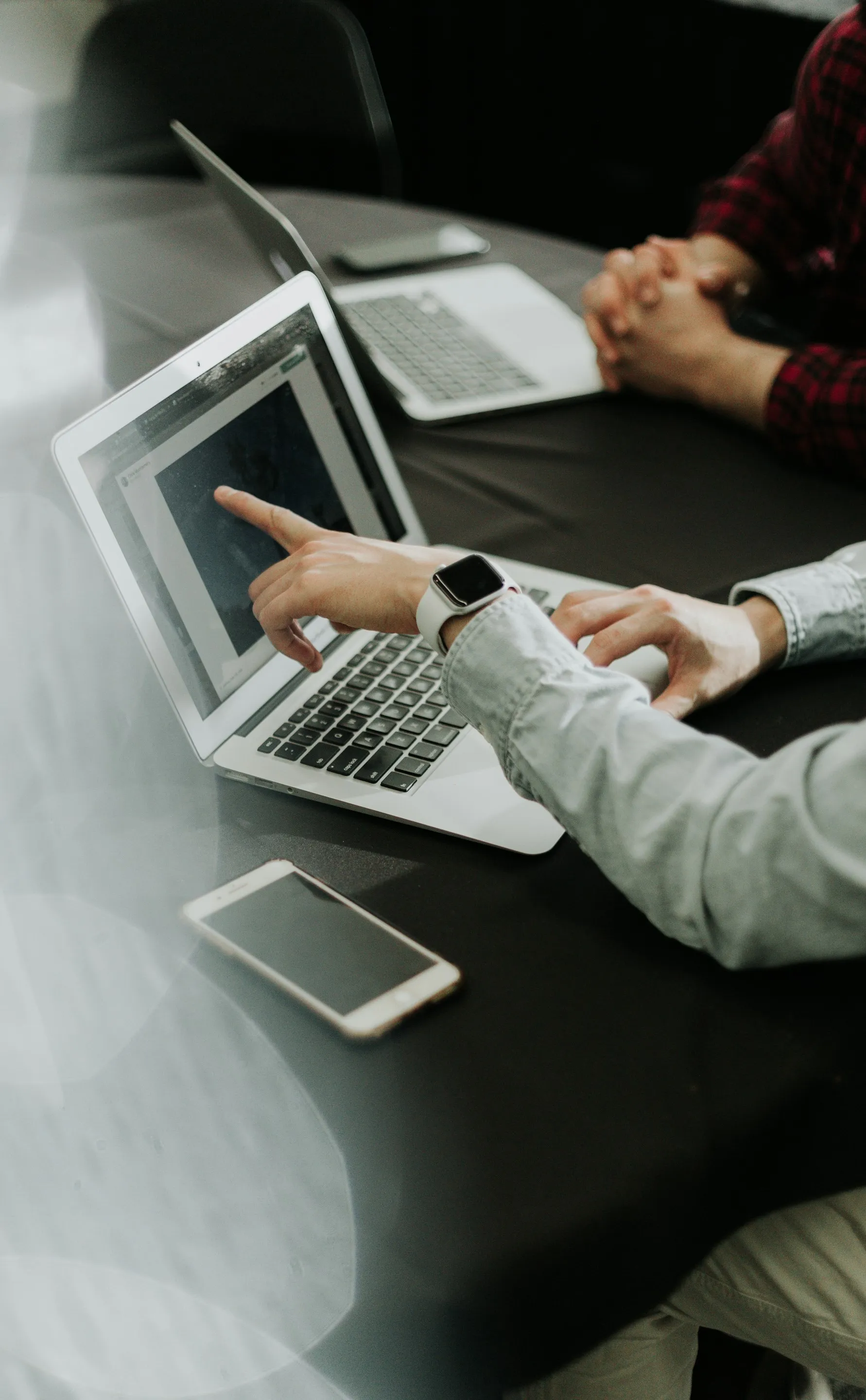 Man Taking notes in a Meeting